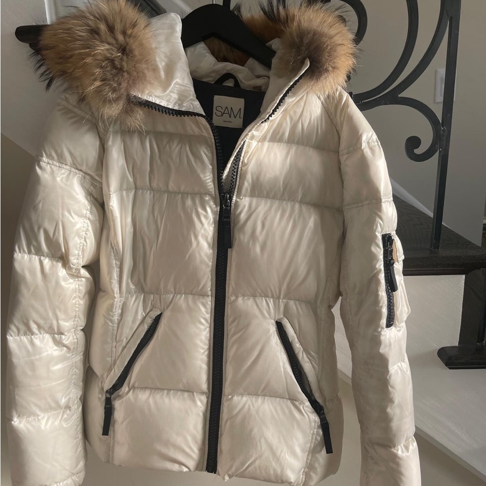 Sam. Coat